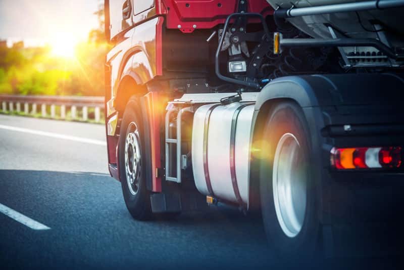 truck on freeway Tips for Selecting Safe Drivers for Your Business