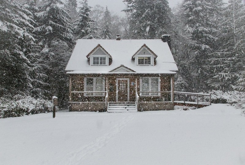 a house covered in snow